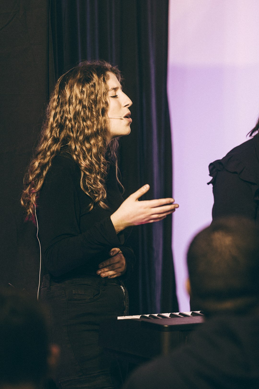 woman acting on stage