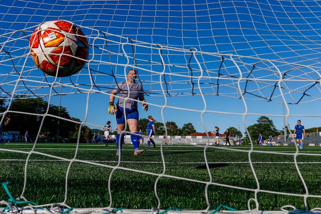 soccer player scoring goal