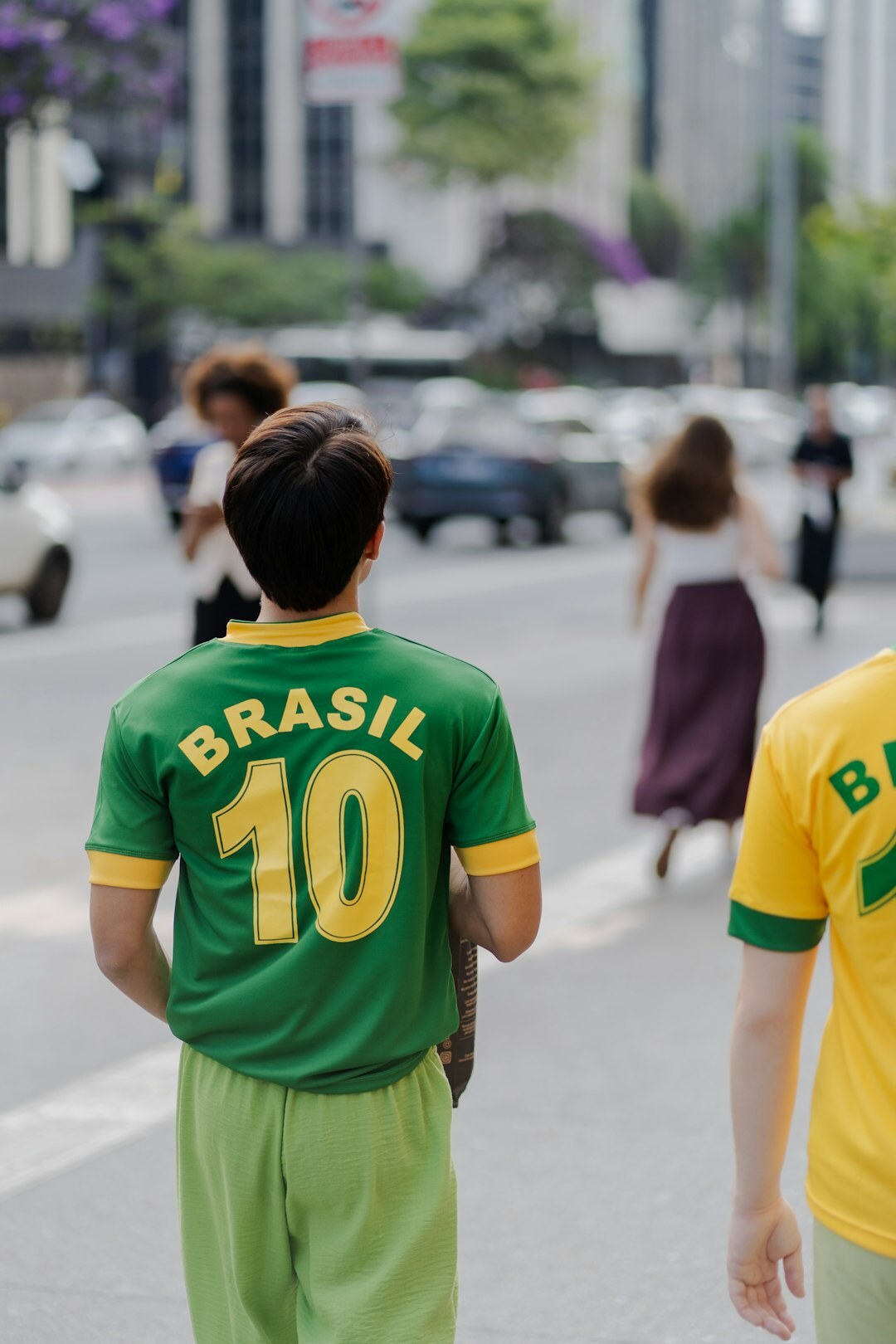 young soccer player on street
